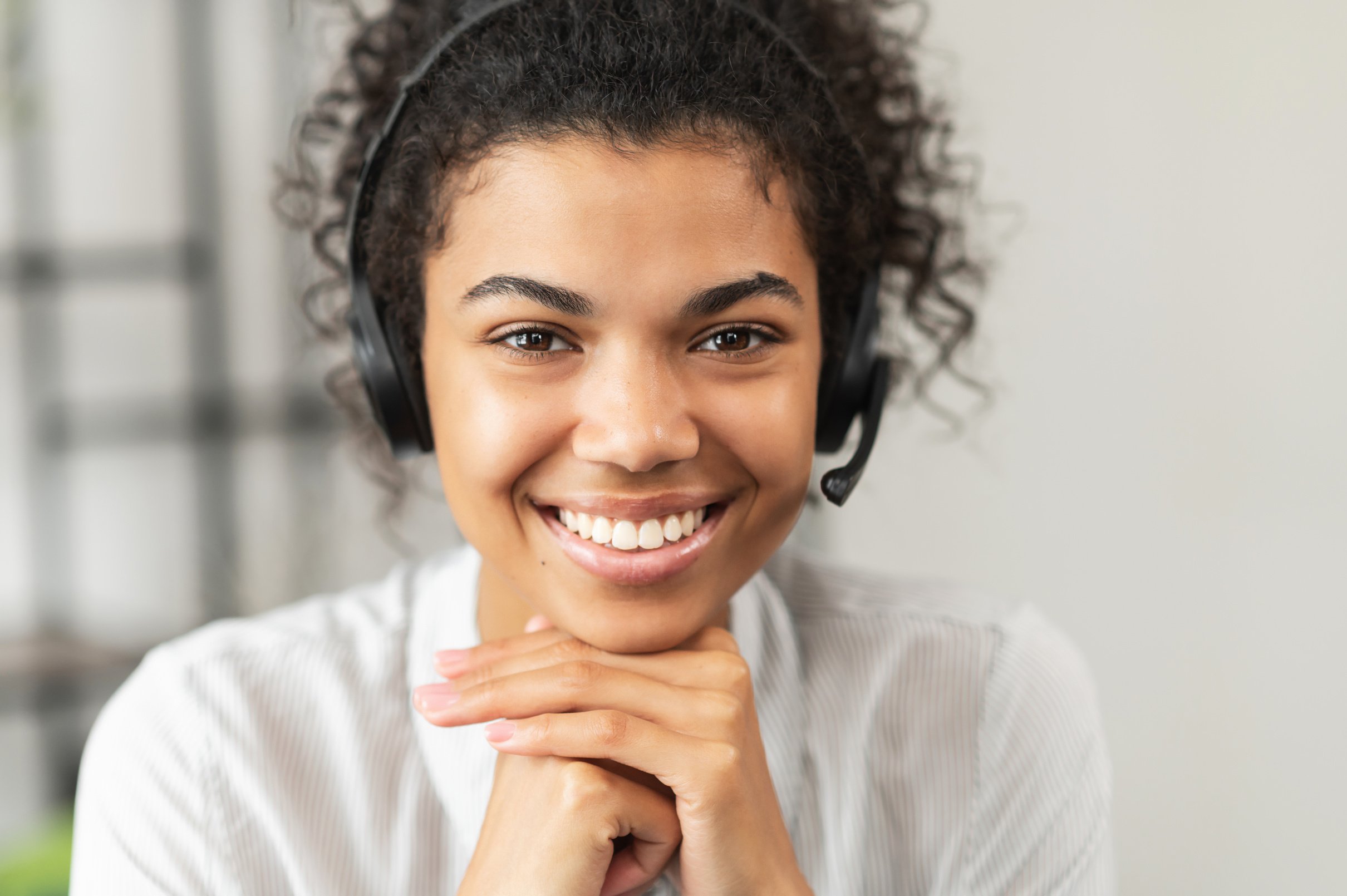 African American young lady wearing a headset